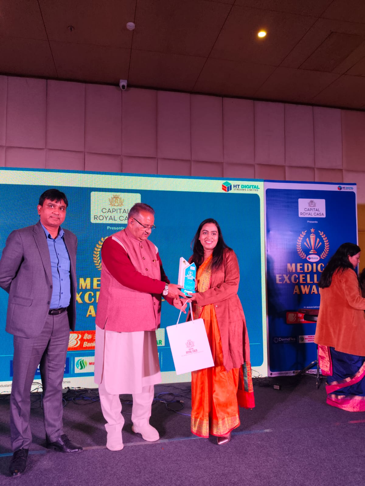 Dr. Nisha Singla receiving the Medical Excellence Award